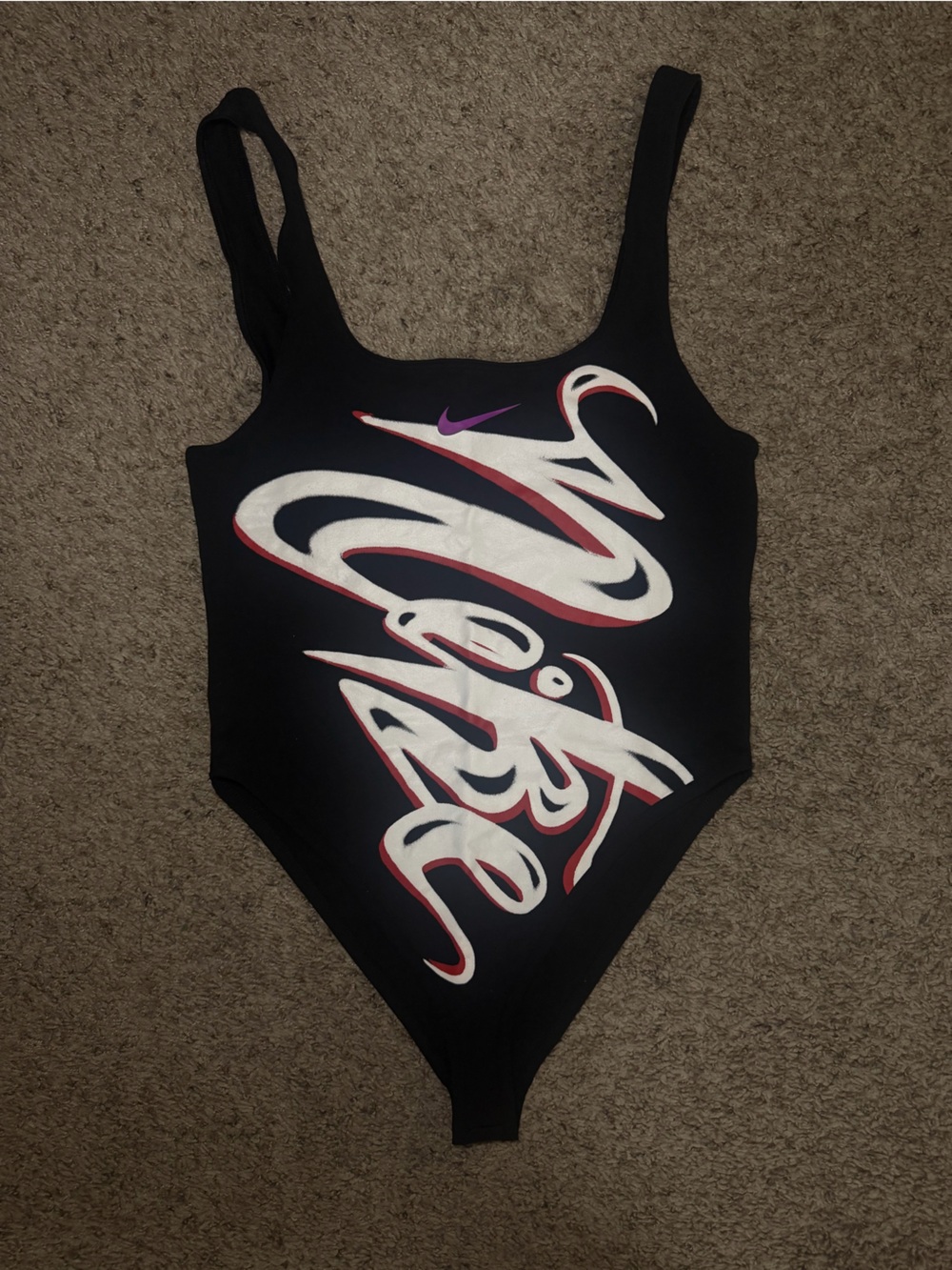 Nike Black Graphic One-Piece Bodysuit with White, Red & Purple Accents